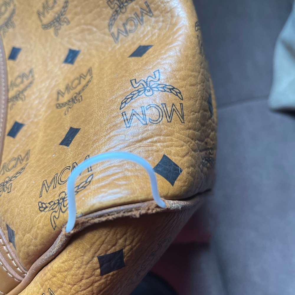 Mcm bag fair condition.. piping at 2 corner minor rub at the other